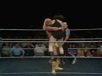 "The Fabulous" Hulk Hogan forces Bill Berger to submit to the bearhug.  (Photo Credit: WWE Network/Peacock)