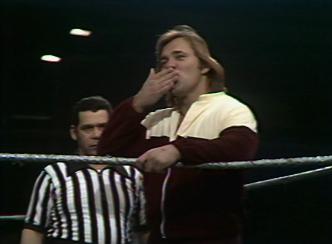 Larry Zbyszko blows a kiss to the audience.  (Photo Credit: WWE Network/Peacock)