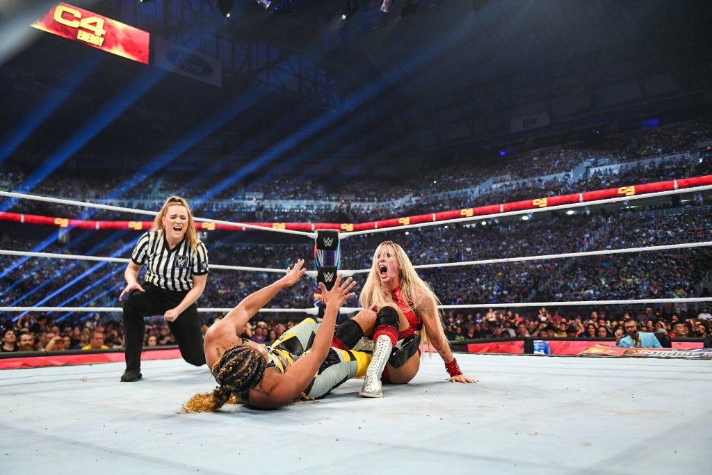 "The Queen" Charlotte Flair applies The Figure-8 on "The EST of the WWE" Bianca Belair. (Photo Credit: WWE)
