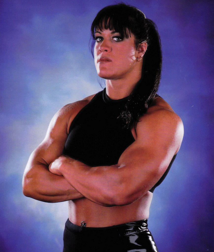 This is Chyna's promotional picture from 1997. She states her reasons for getting plastic surgery was "...for reconstructive reasons and to get a little cleavage." (Photo Credit: WWE)