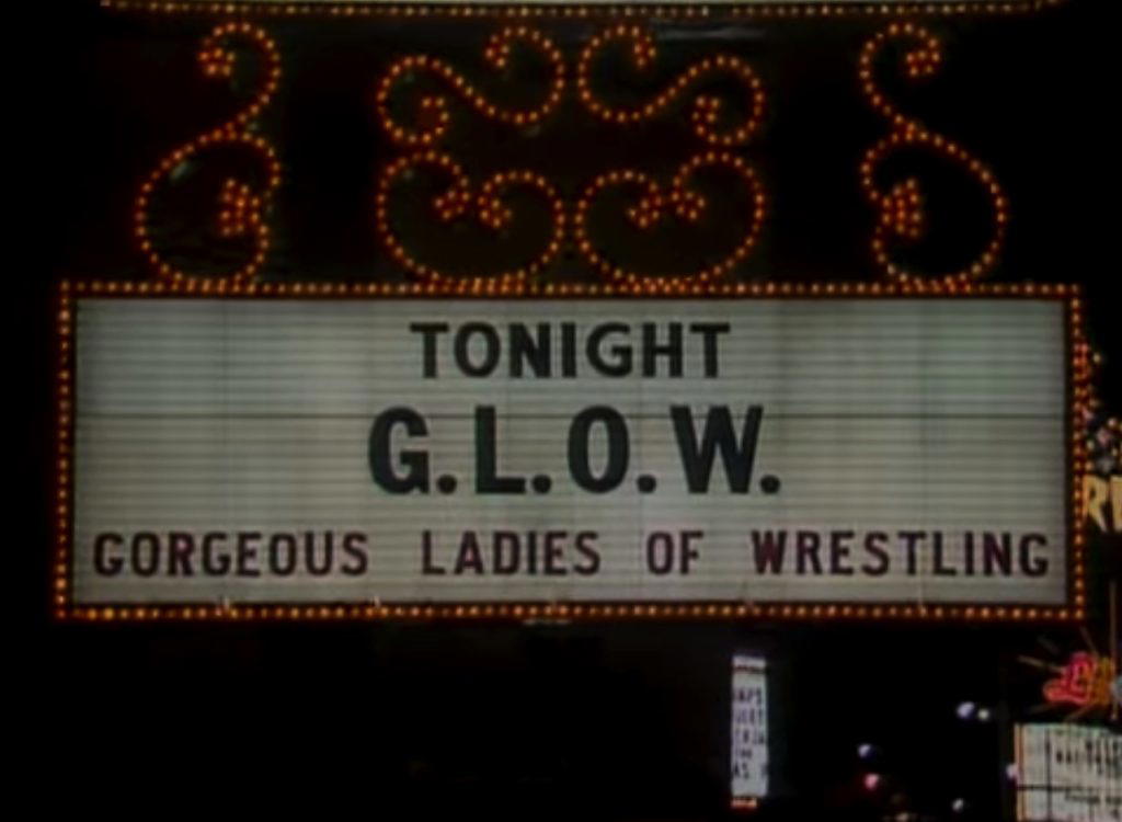 Justin Roberts watched Gorgeous Ladies of Wrestling (G.L.O.W.) before he discovered the World Wrestling Federation (WWF).  (Photo Credit: G.L.O.W.)