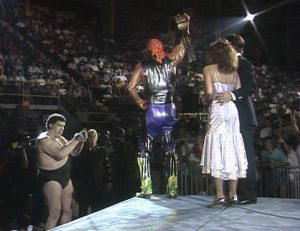 Andre The Giant & Bobby"The Brain"Heenan distract the WWF World Heavyweight Champion: Randy"Macho Man"Savage & Miss Elizabeth on an episode of WWF Superstars of Wrestling. (Photo Credit: WWE)