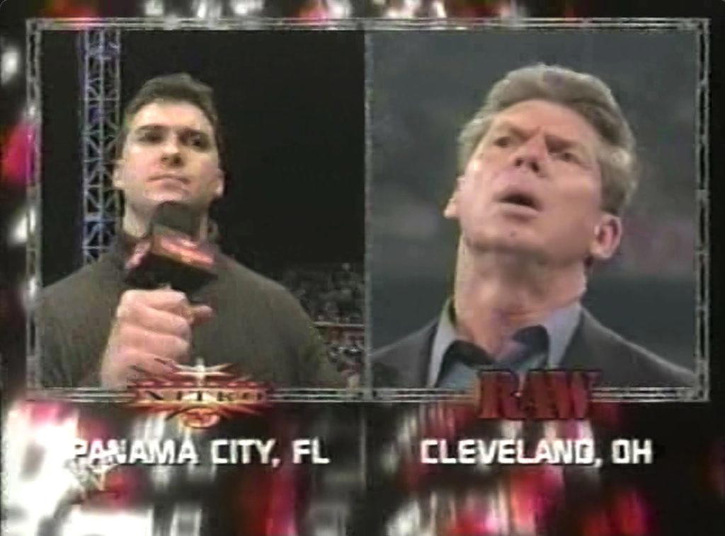 The most historic moment in wrestling history: Shane McMahon on "WCW Monday Nitro" and Vince McMahon on "WWF RAW is WAR."  (Photo Credit: WWE)