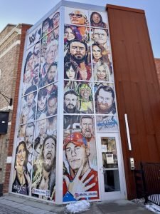 Local artist JD Bills painted a mural featuring past and present WWE superstars who have participated in the Royal Rumble Match. For more on JD Bills visit his website at https://www.JDBills.com/.